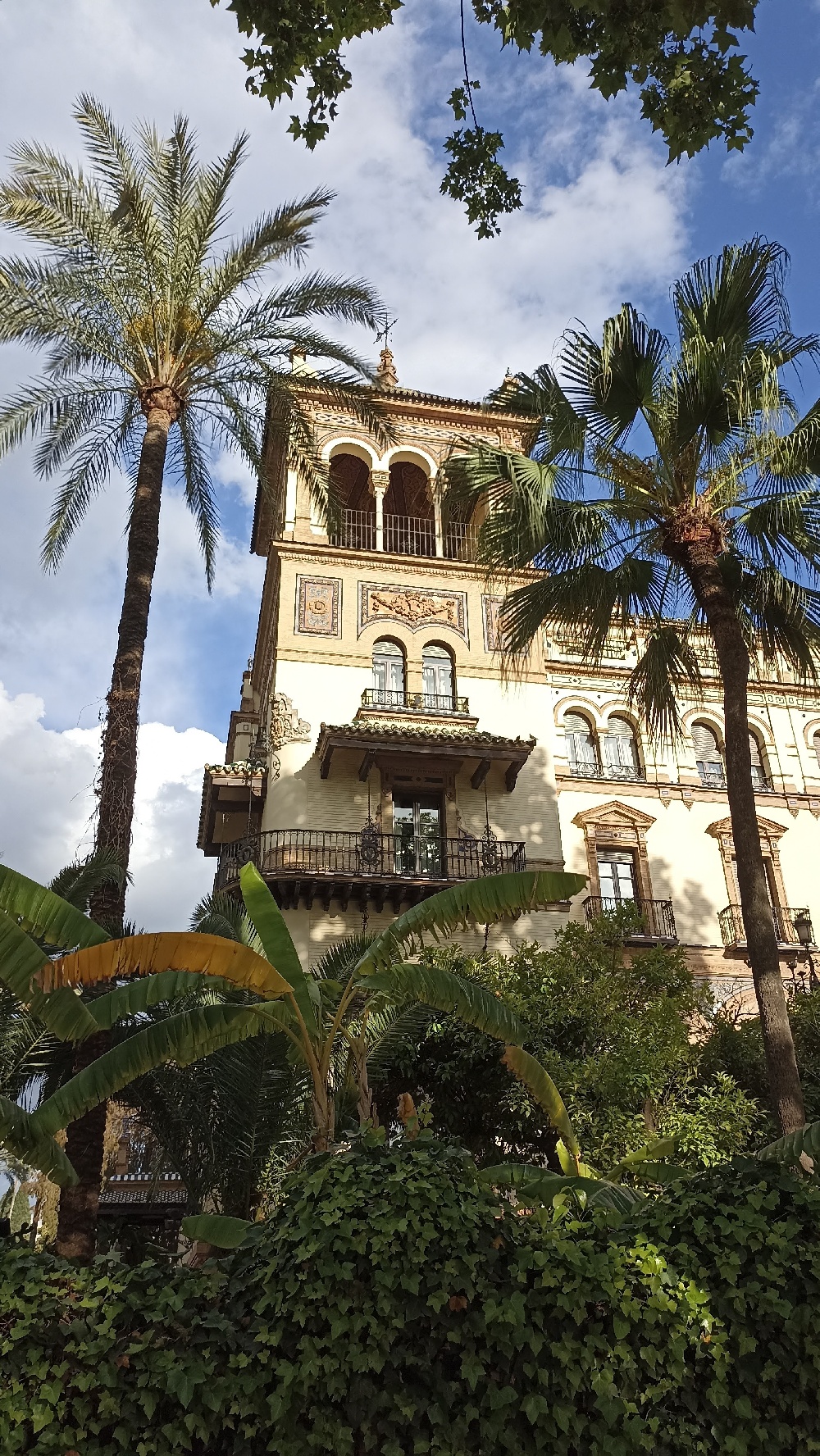 Spanish architecture building with palm trees