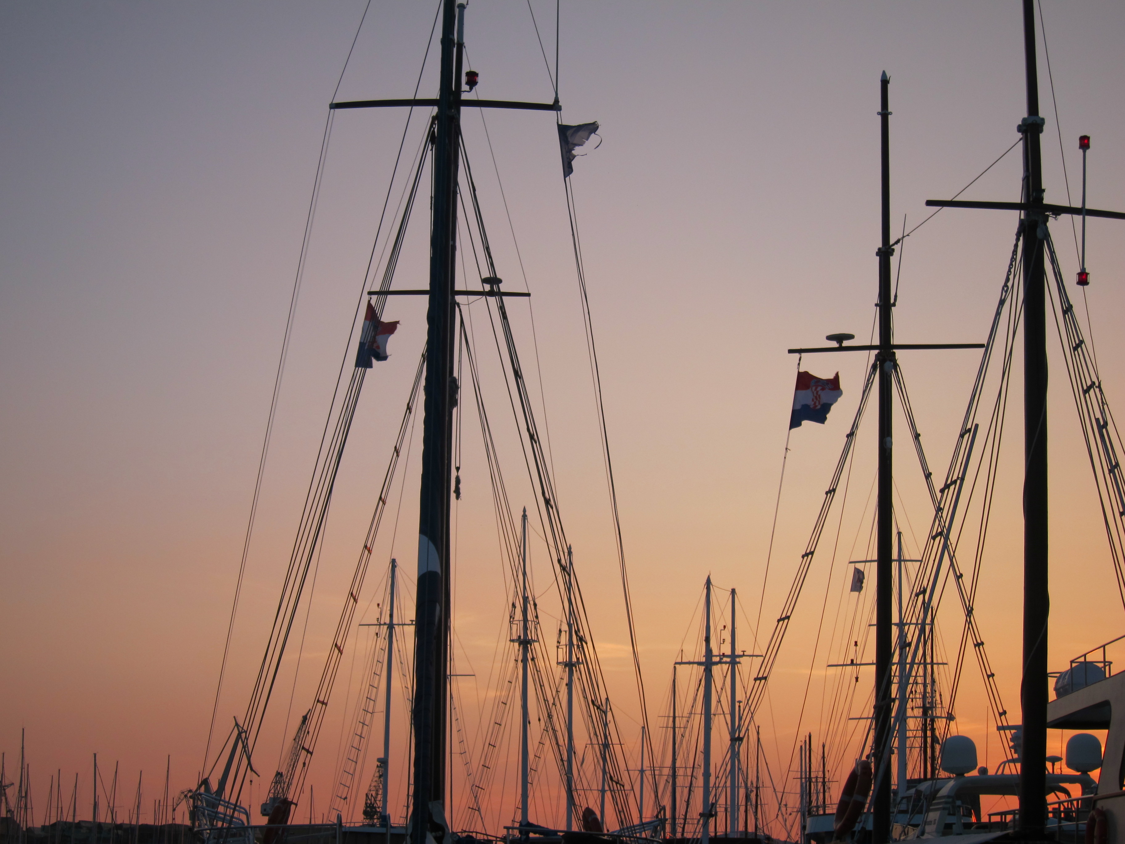 Croatia south dalmatia bike tour sail boats sunset