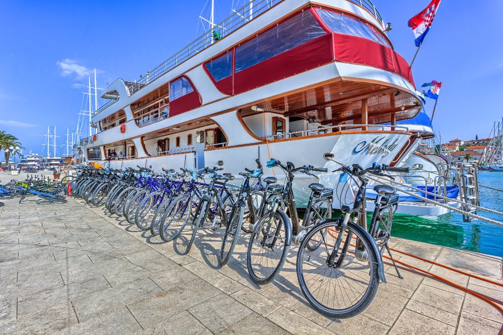 Melody boat docked next to Bikes