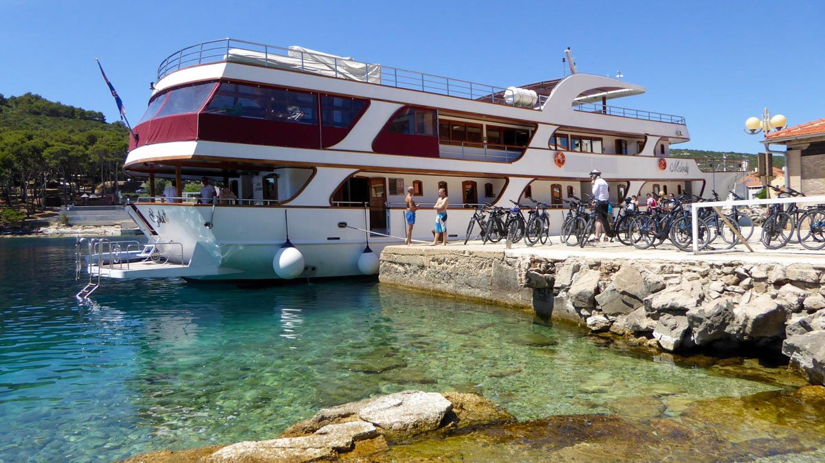 melody boat docked with bikes